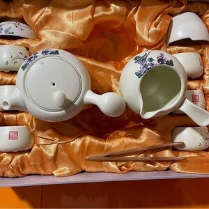 Elegant Cream Tea Set with Floral Design